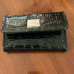 LIZ CLAIBORNEORNE BLACK EMBOSSED WALLET. MANY COMPARTMENTS. 5.5 X 3.5.  NEW